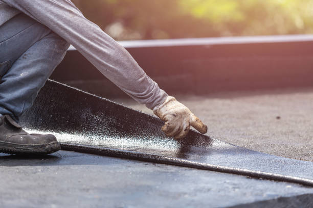 Professional Waterproofing technician working in Devon, PA